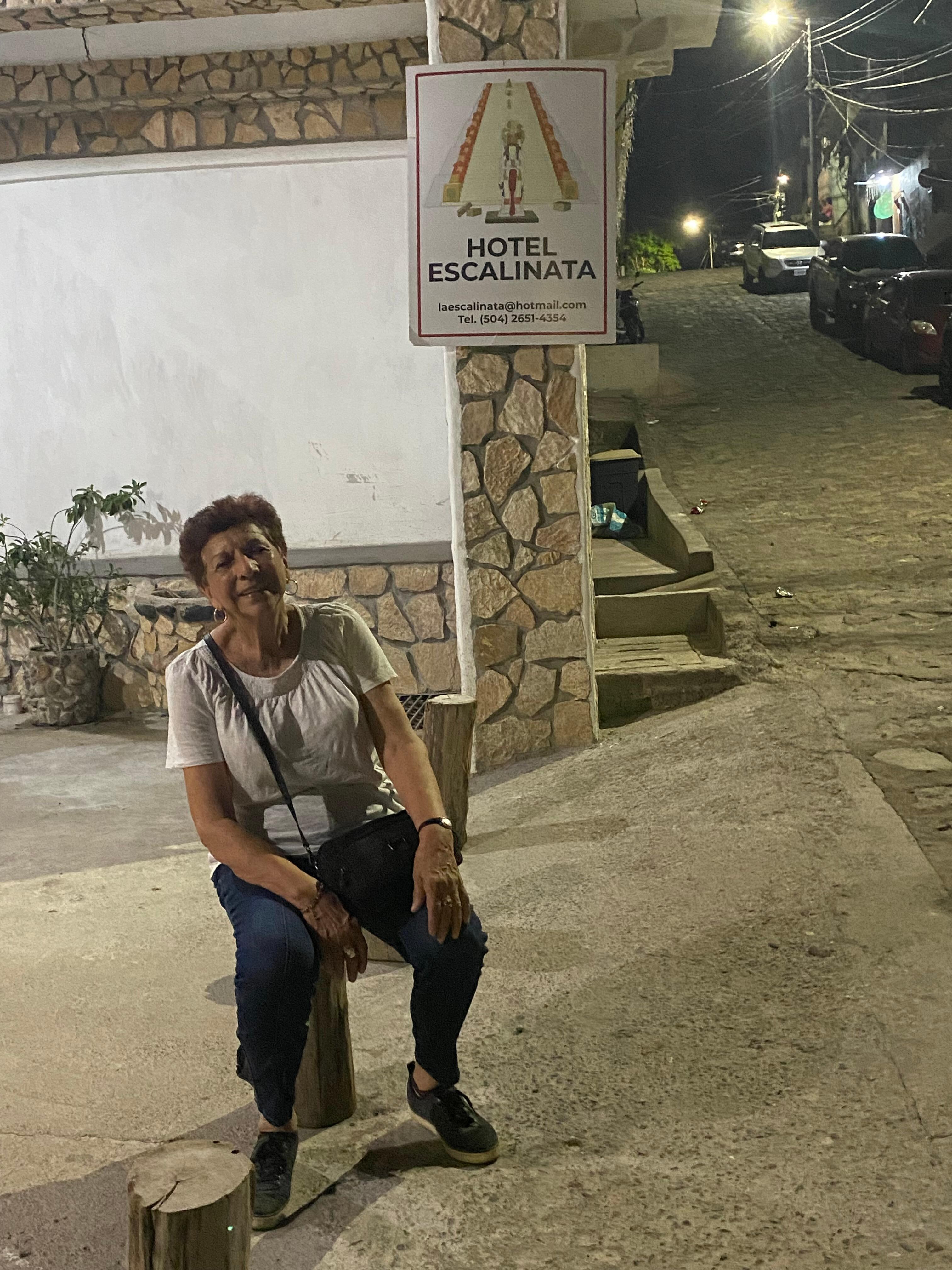 My mom feeling a bit tired from the uphill walk. 