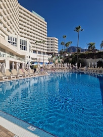 Great out door pools and lots of sun beds