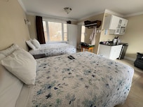 Sweet room with a small kitchenette.