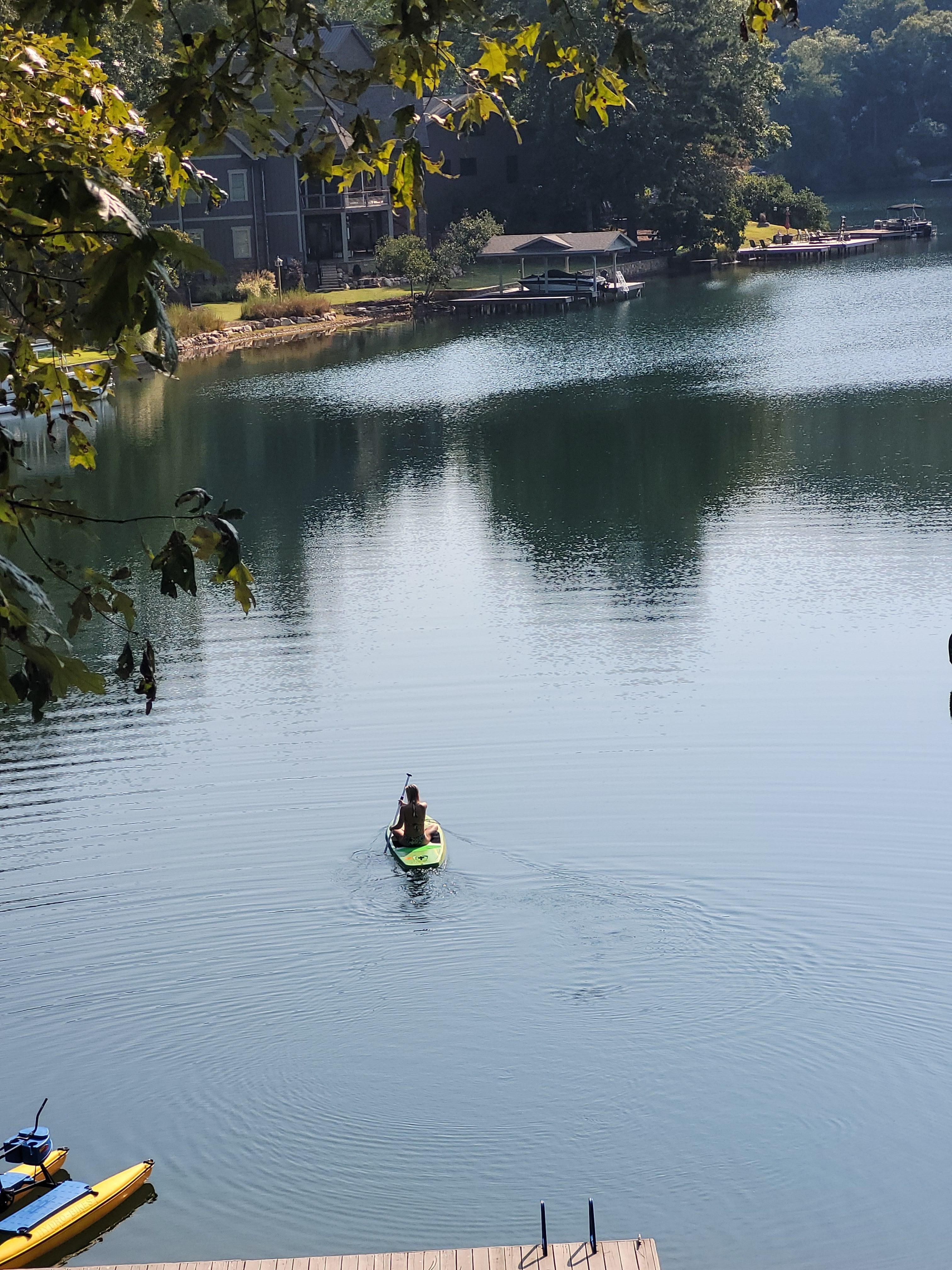 Paddle boarding off the dock 