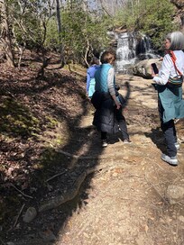 Hiking to waterfalls on one of many hiking trails in the area.