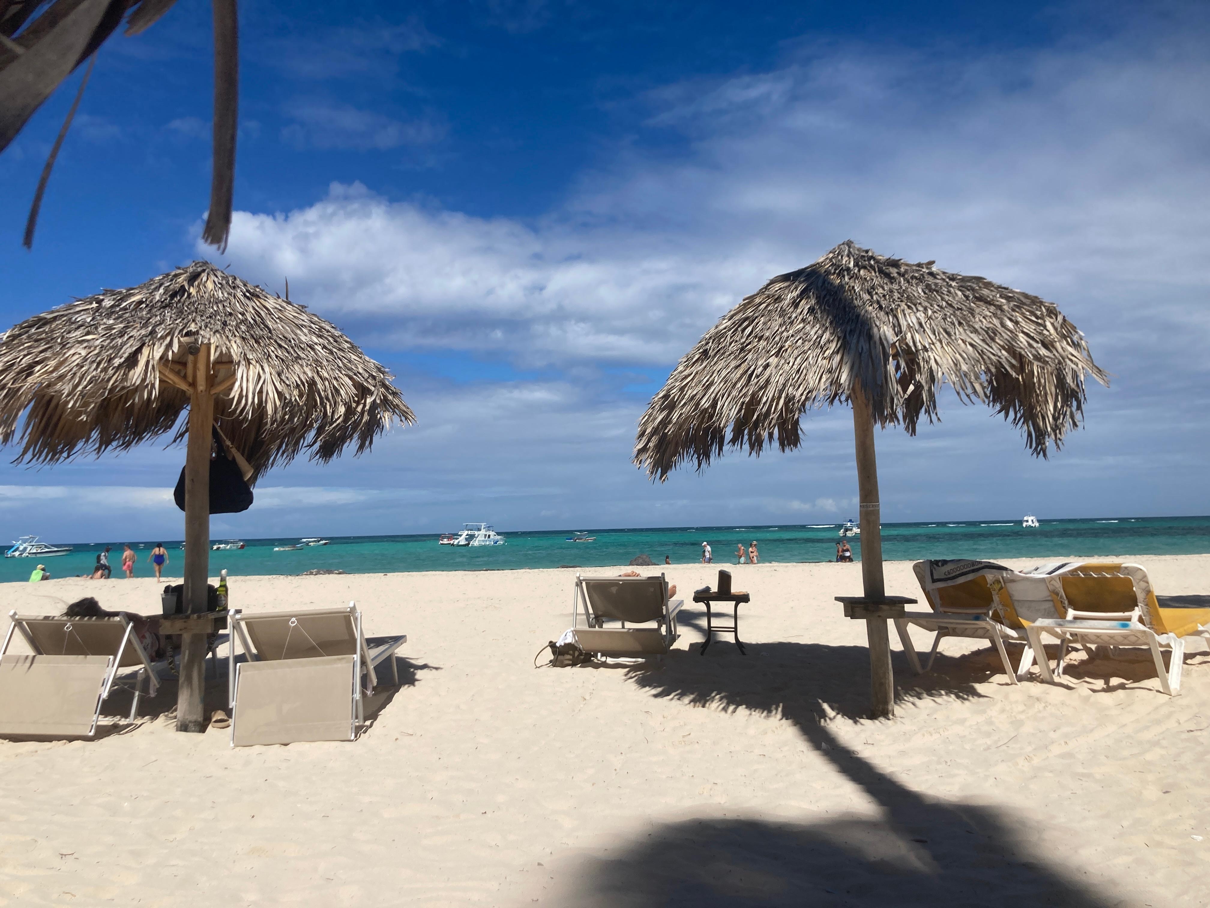 Beach is steps from the apartment. Loungers and cabanas are included.