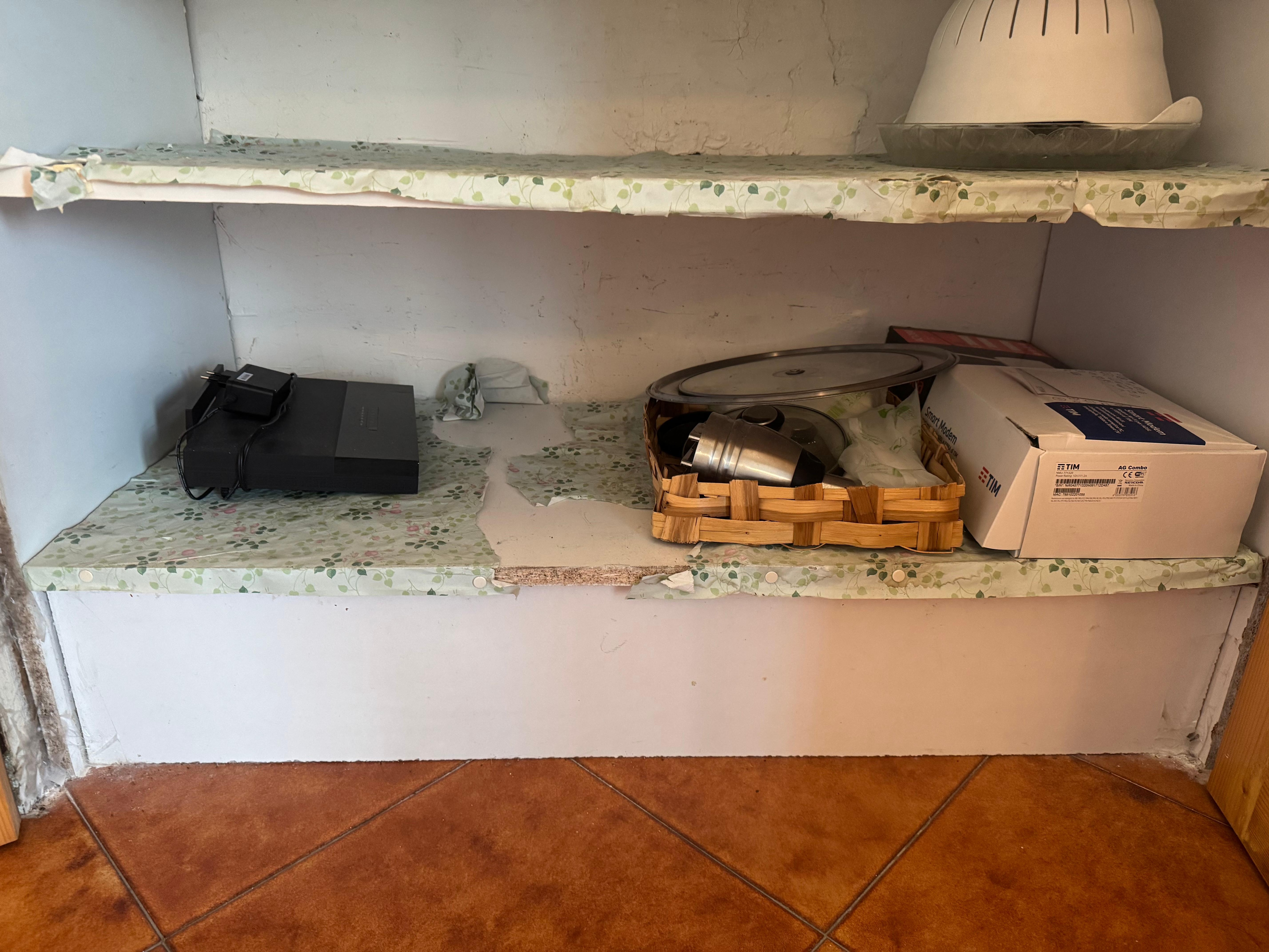 This is the cupboard where kitchen things are kept.