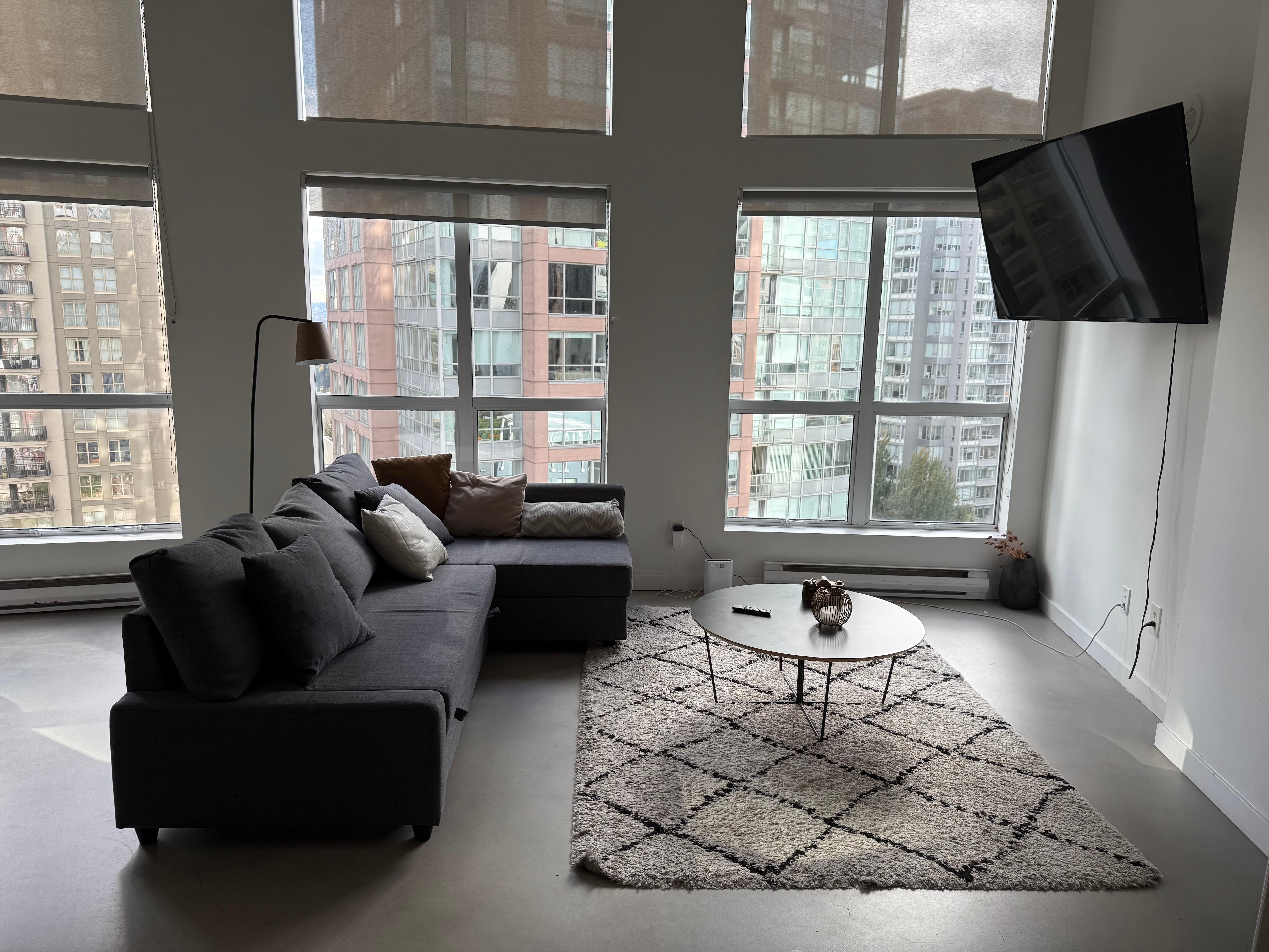 Our loungeroom in Condo with huge Tv to watch  Netflix and Disney Apps