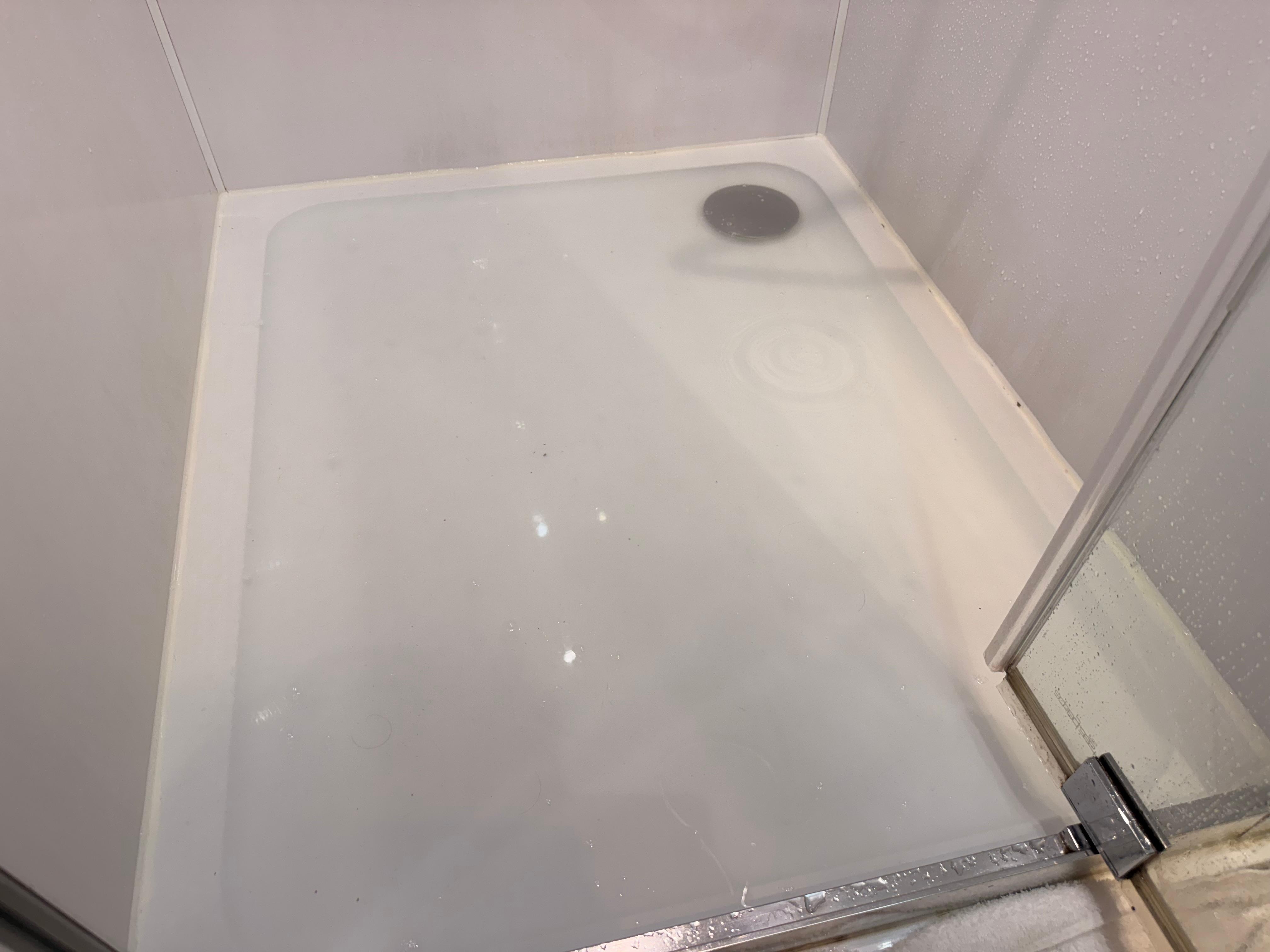 The shower flooding as the drain was completely blocked.
