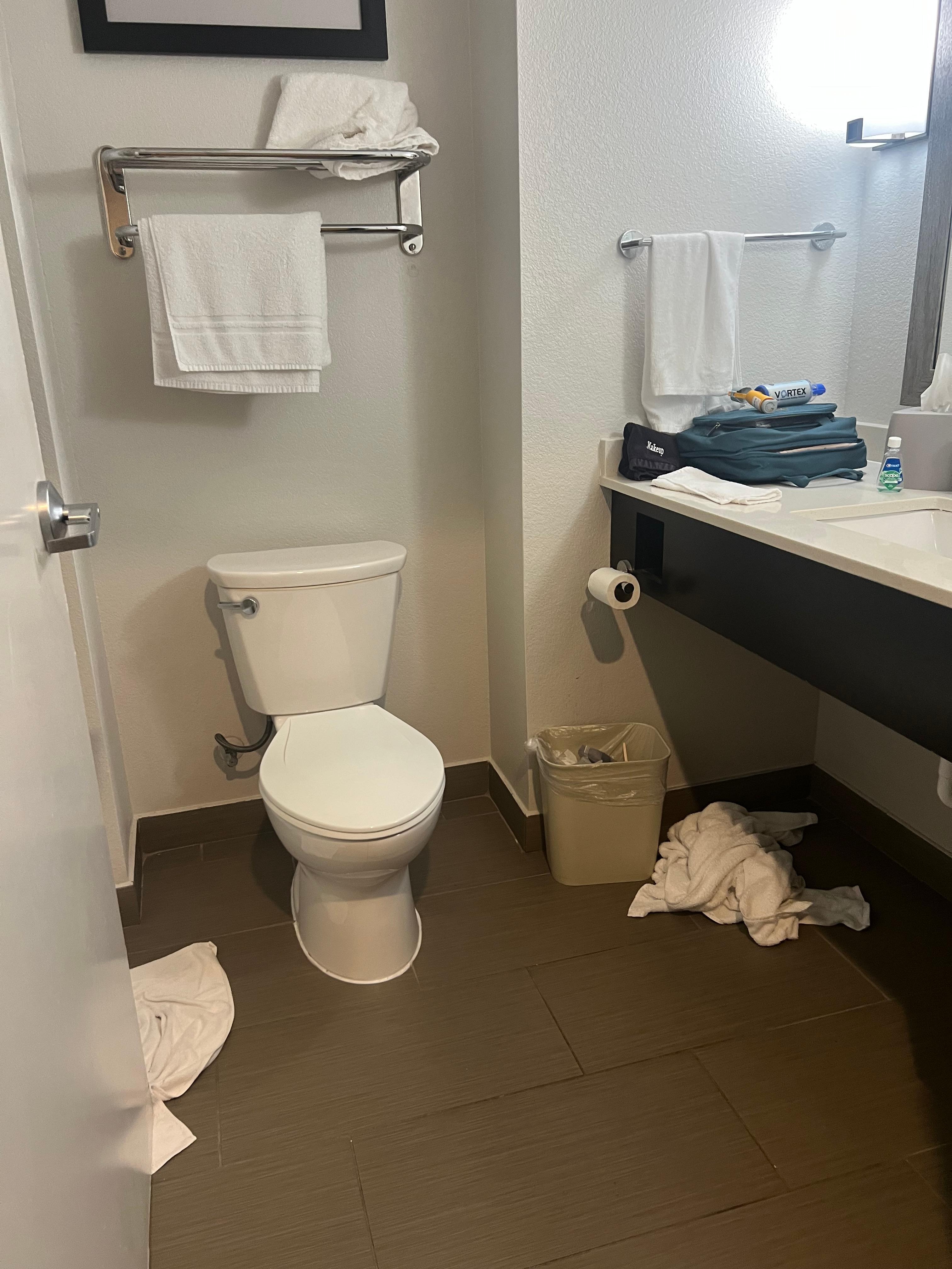 Day 4–dirty bathroom—after requests, 1 clean towel tossed on top rack.