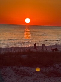 This was taken a little ways down the beach but you can watch the sunsets from the porch