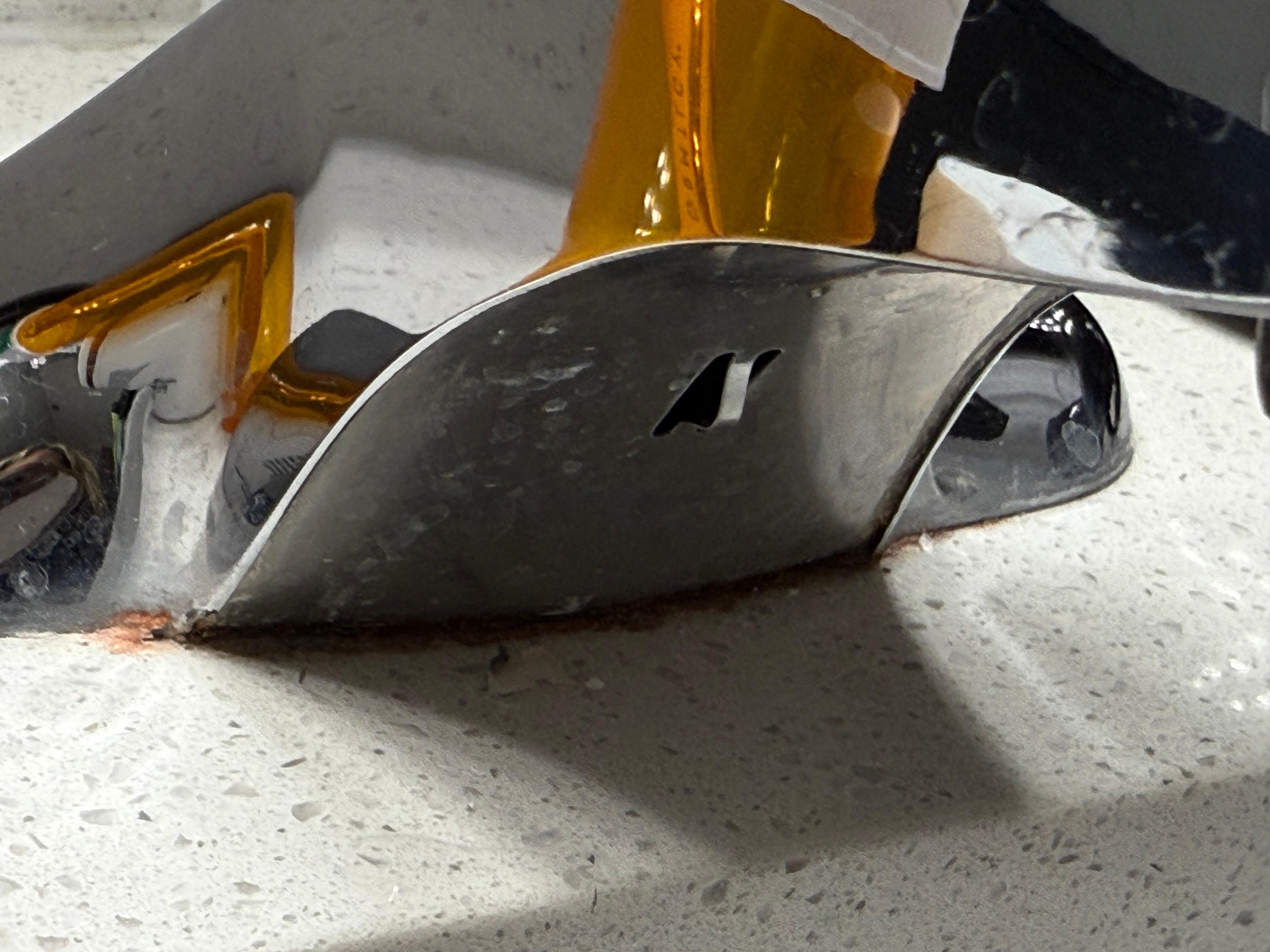 Mildew and splatter under bathroom faucet