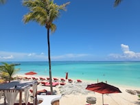 The pink (coral) lounge chairs are for Infinite Guests.