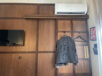 Barn door slides shut to conceal bathroom, so cute!