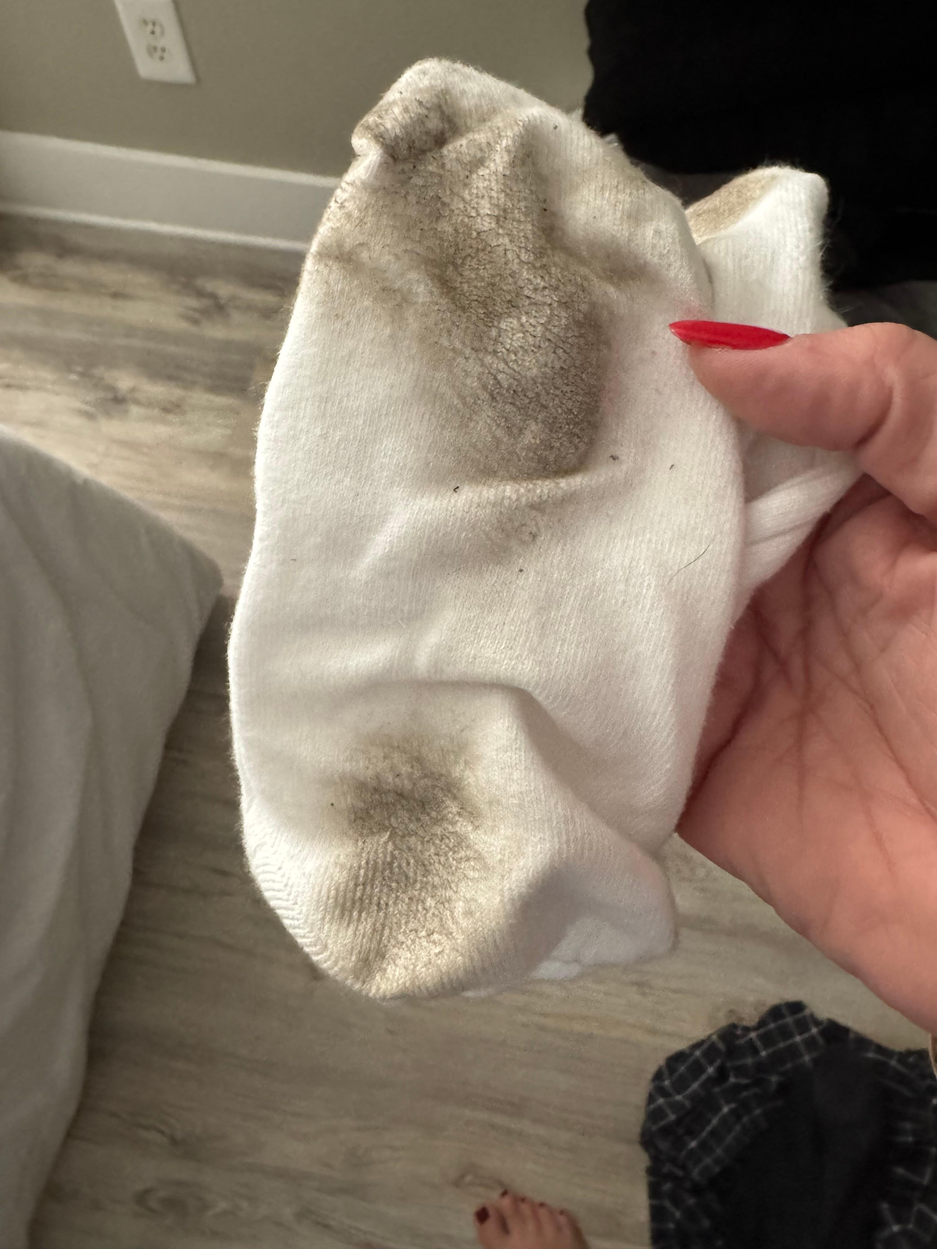 My socks after one walk in socks from living room to bedroom. The place is small and not nice like the photos. 