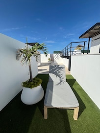 Small private places to relax near the pool.
