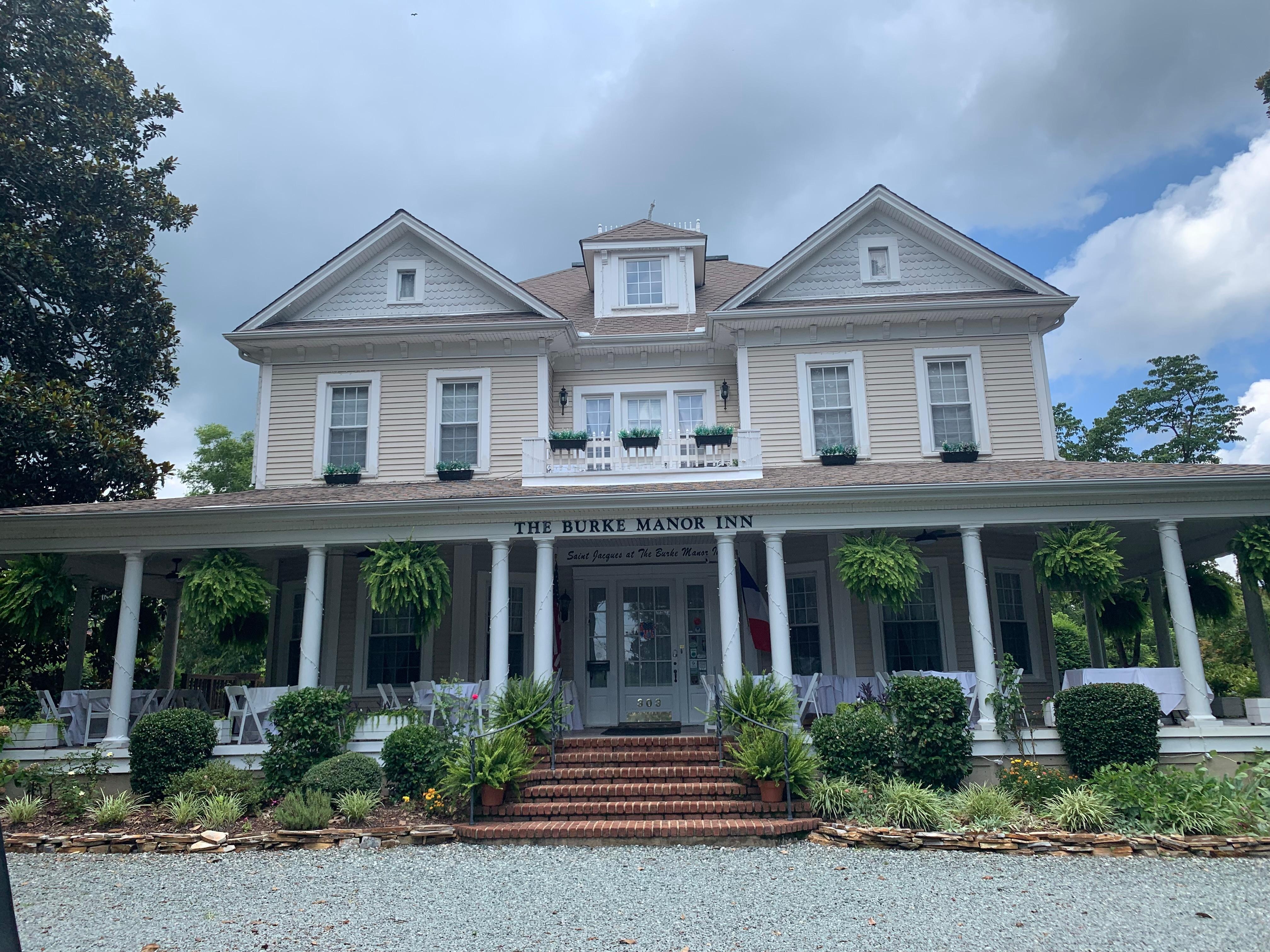 Front of B&B huge wrap around porch. 