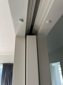 Cavity sliding door is broken. We tried to move it but it had come off the railing.