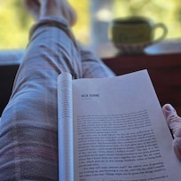 Relaxing on the porch with coffee and a new book