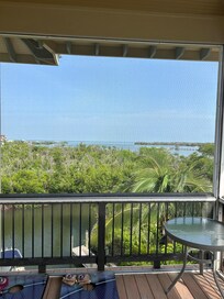 Breakfast from screened in top deck (nice for buggy nights)