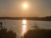Canoe and kayak. Pictures taken from in front of cabin. Minimal zoom used
