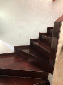 Entrance ground level with stairs to kitchen