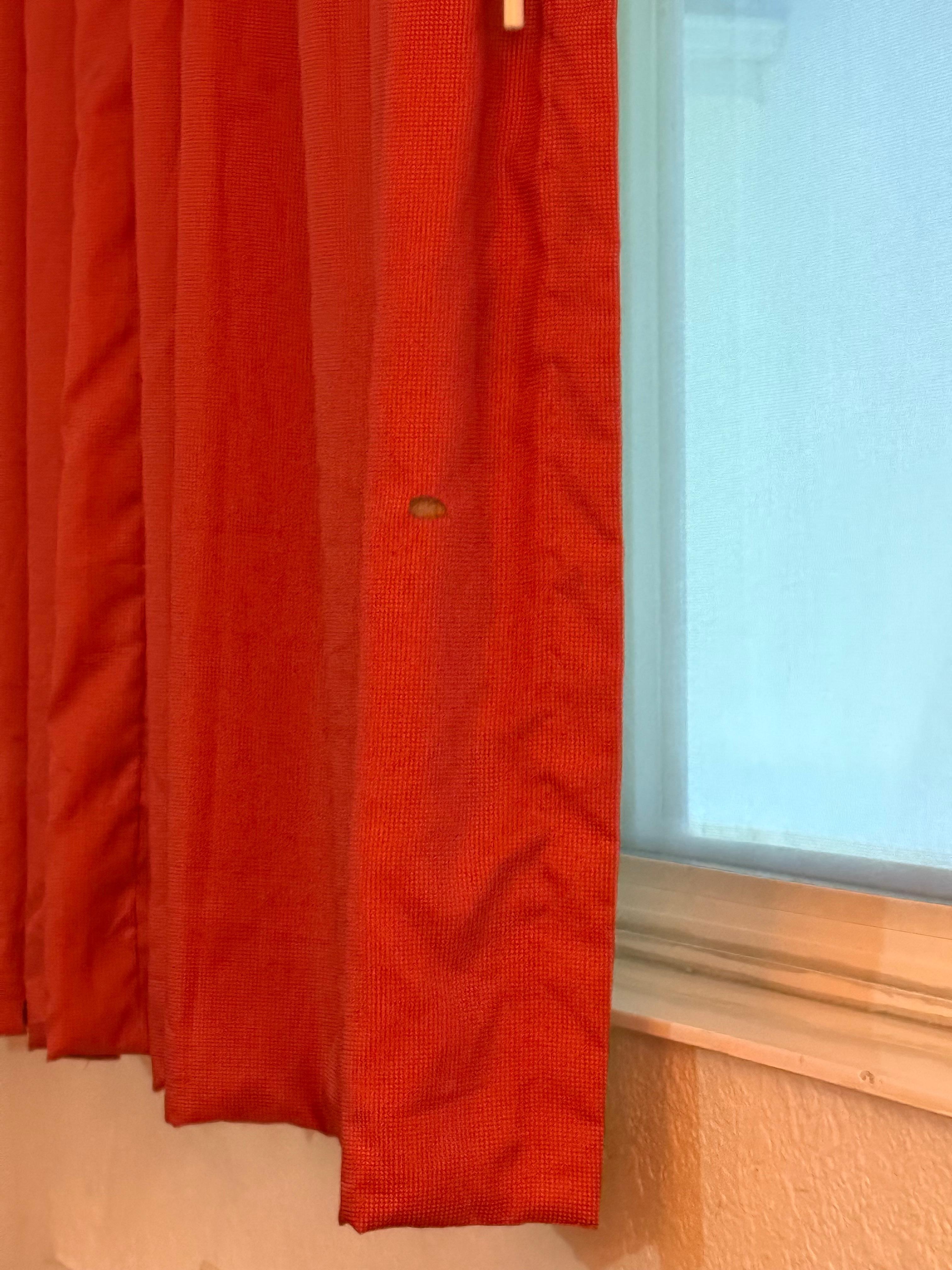 Cigarette burned curtains