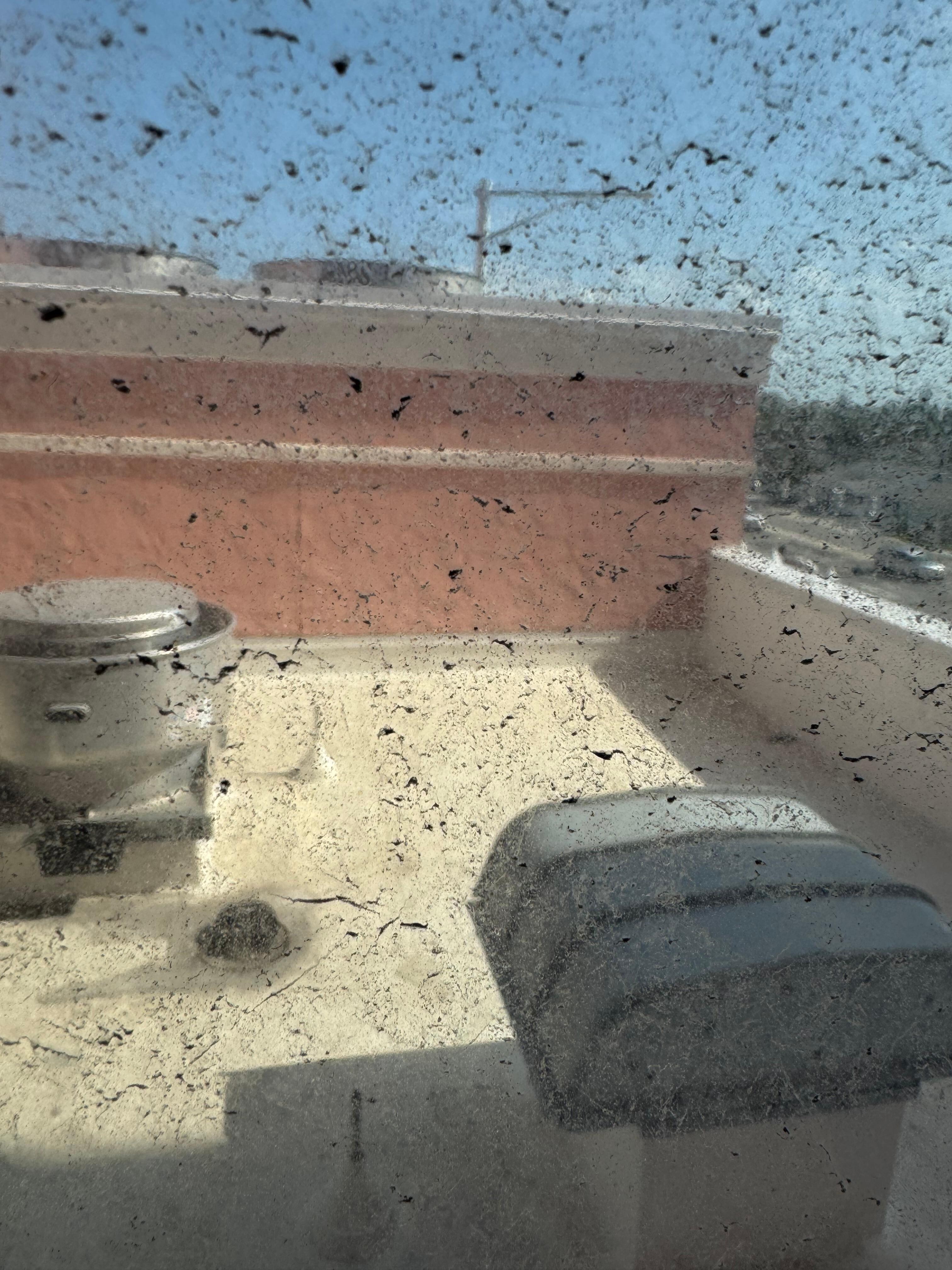 The lovely view from our 675 a night room with filthy window. 
