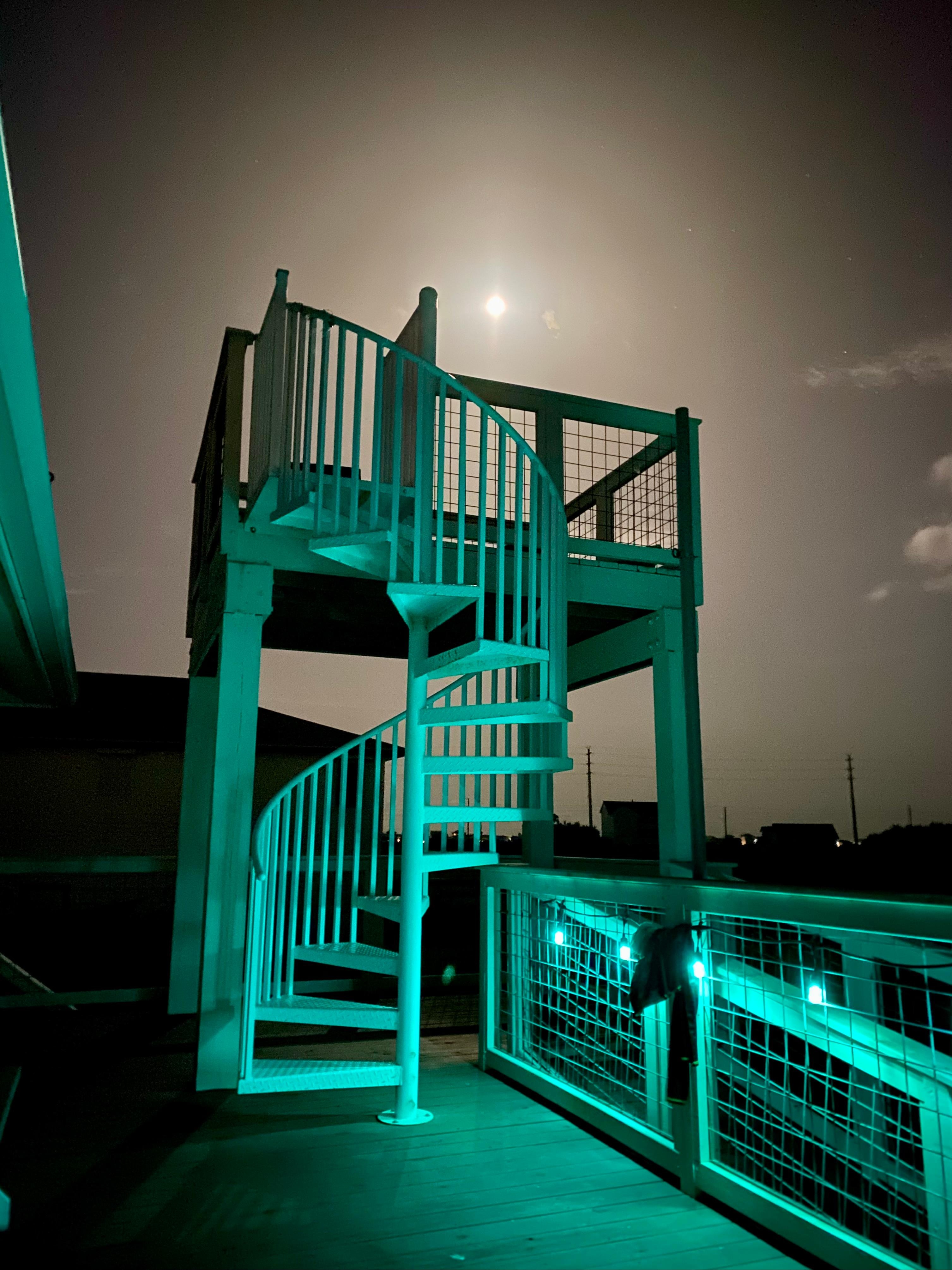 Super cool third floor deck at nighttime!