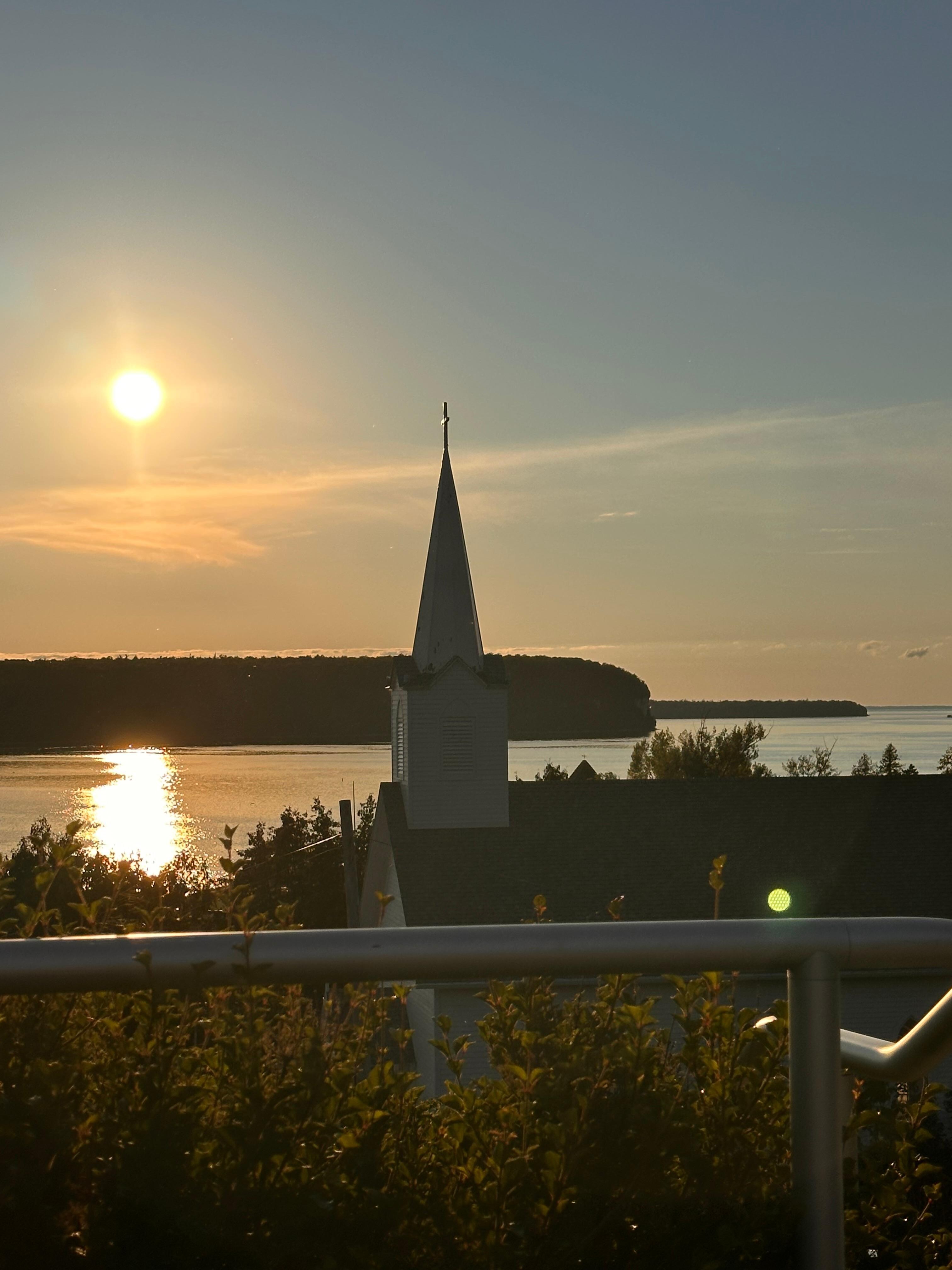 Sunset over the bay at top of steps. 