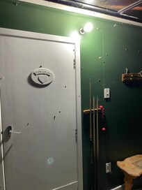 Moths in the sunroom, on the door to the kitchen.