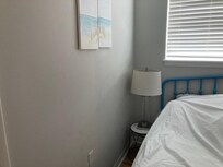 wobbly night stands with not much room for a king bed in second bedroom.