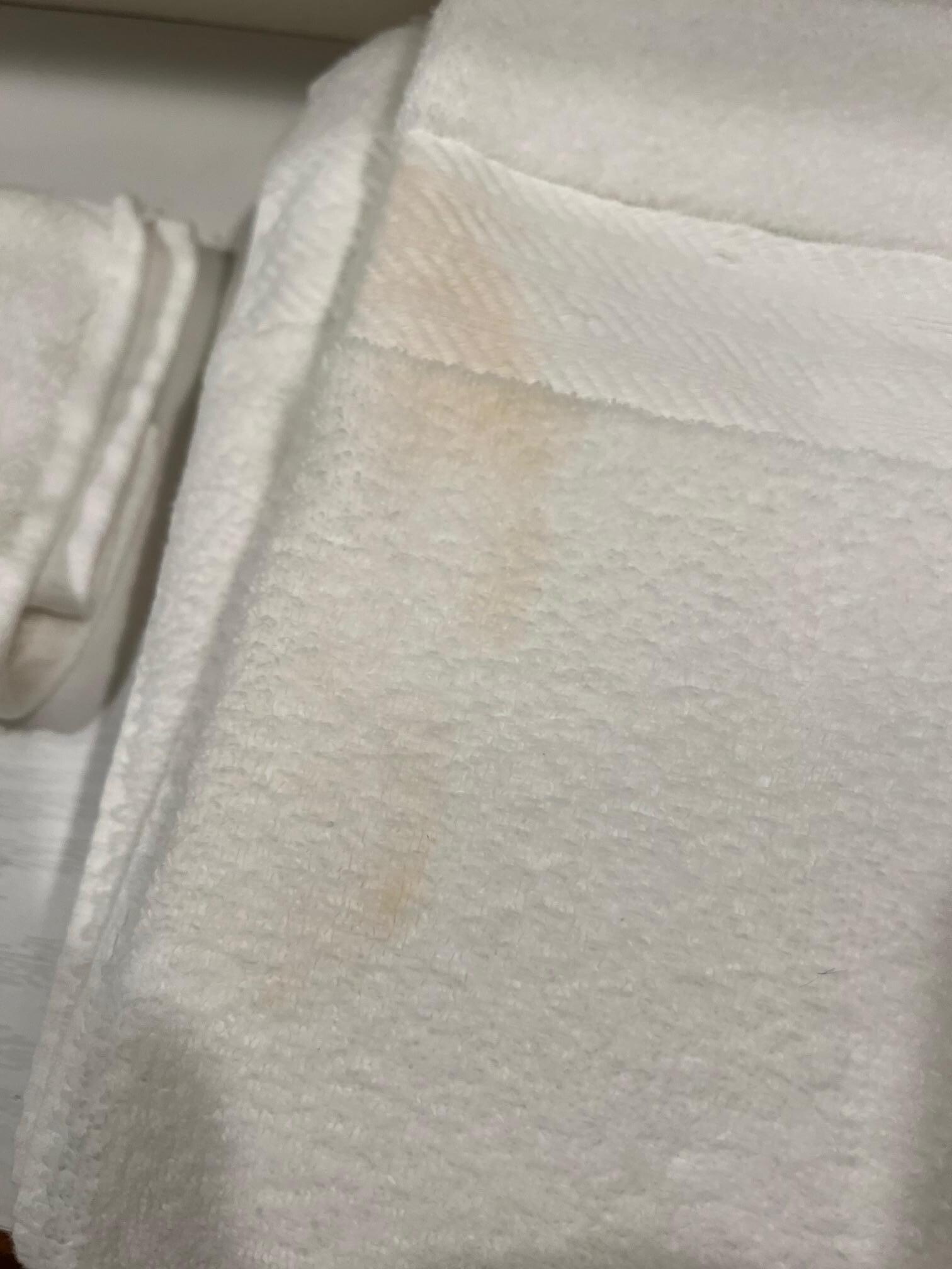 Bath towel with large stain