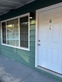 Cute outside, Doors open to parking lot.