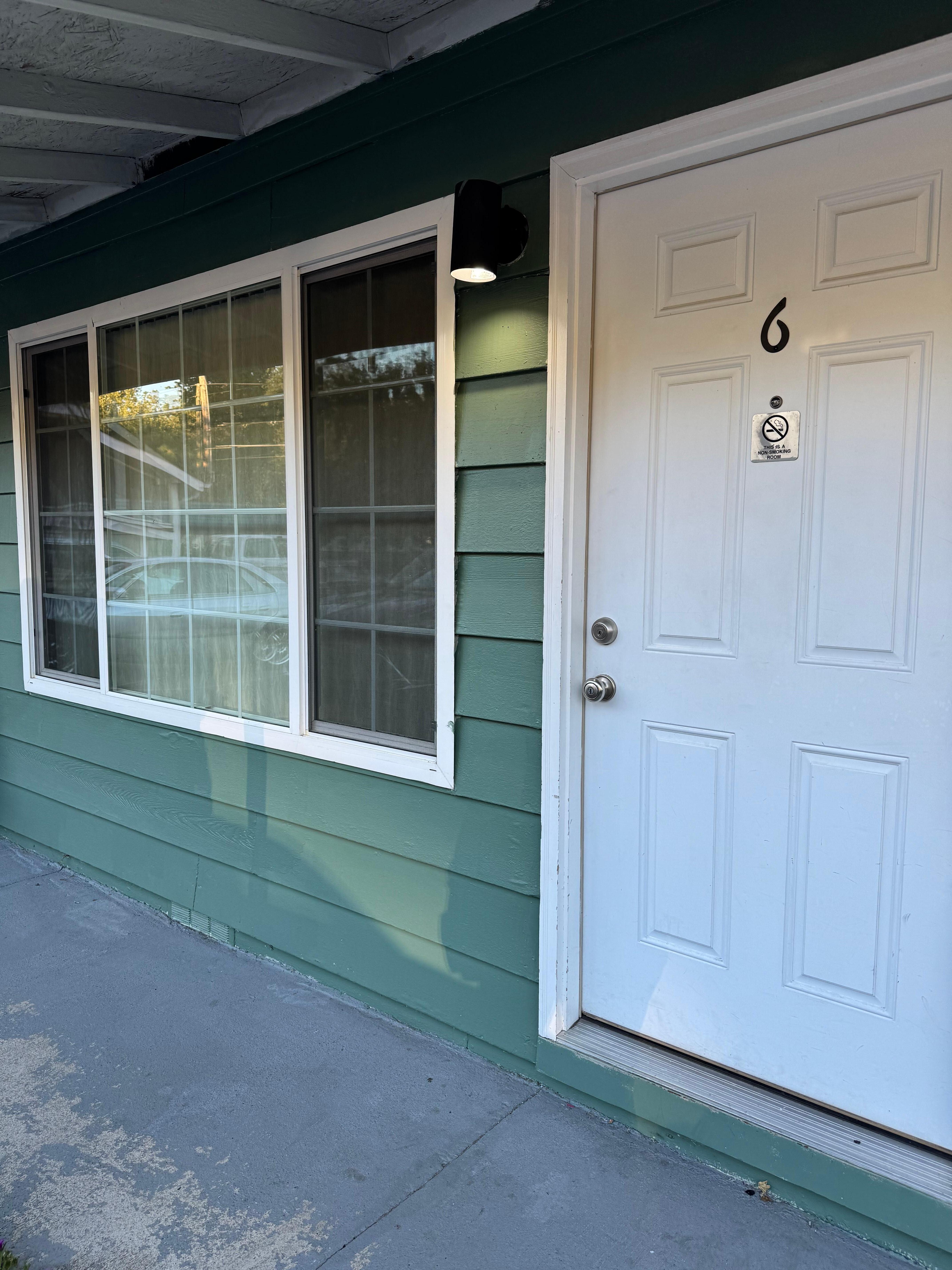 Cute outside, Doors open to parking lot.