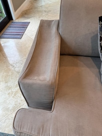 Here is the sofa with missing arm cushioning