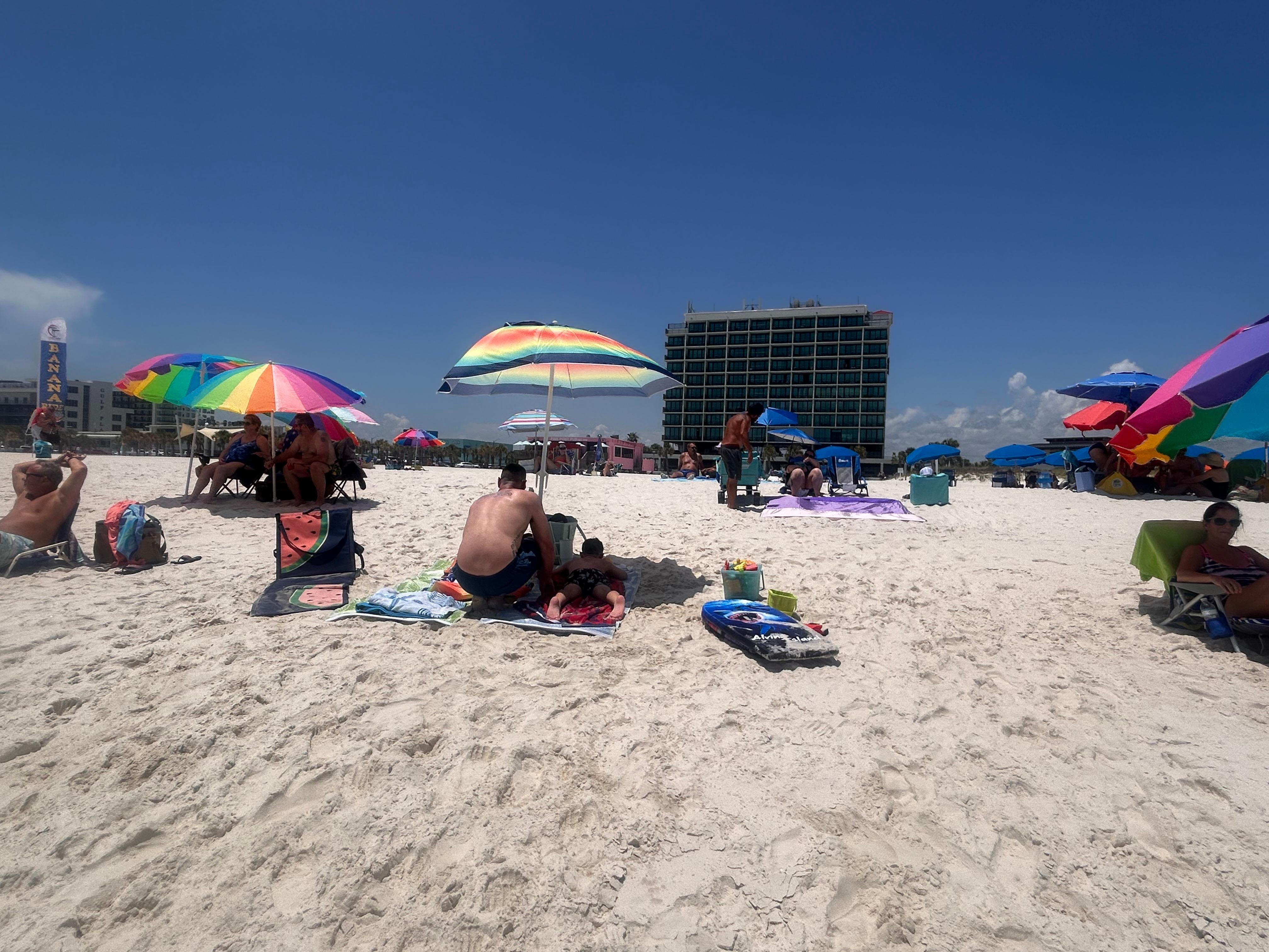 Our spot at the beach with the condo behind us.