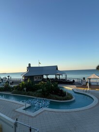 Bar and Grill/ pool area. Lots of room, lounge chairs were clean and well kept. Hot tub was wonderful as well as the lazy river and large pool. Several options to eat breakfast outside as well.