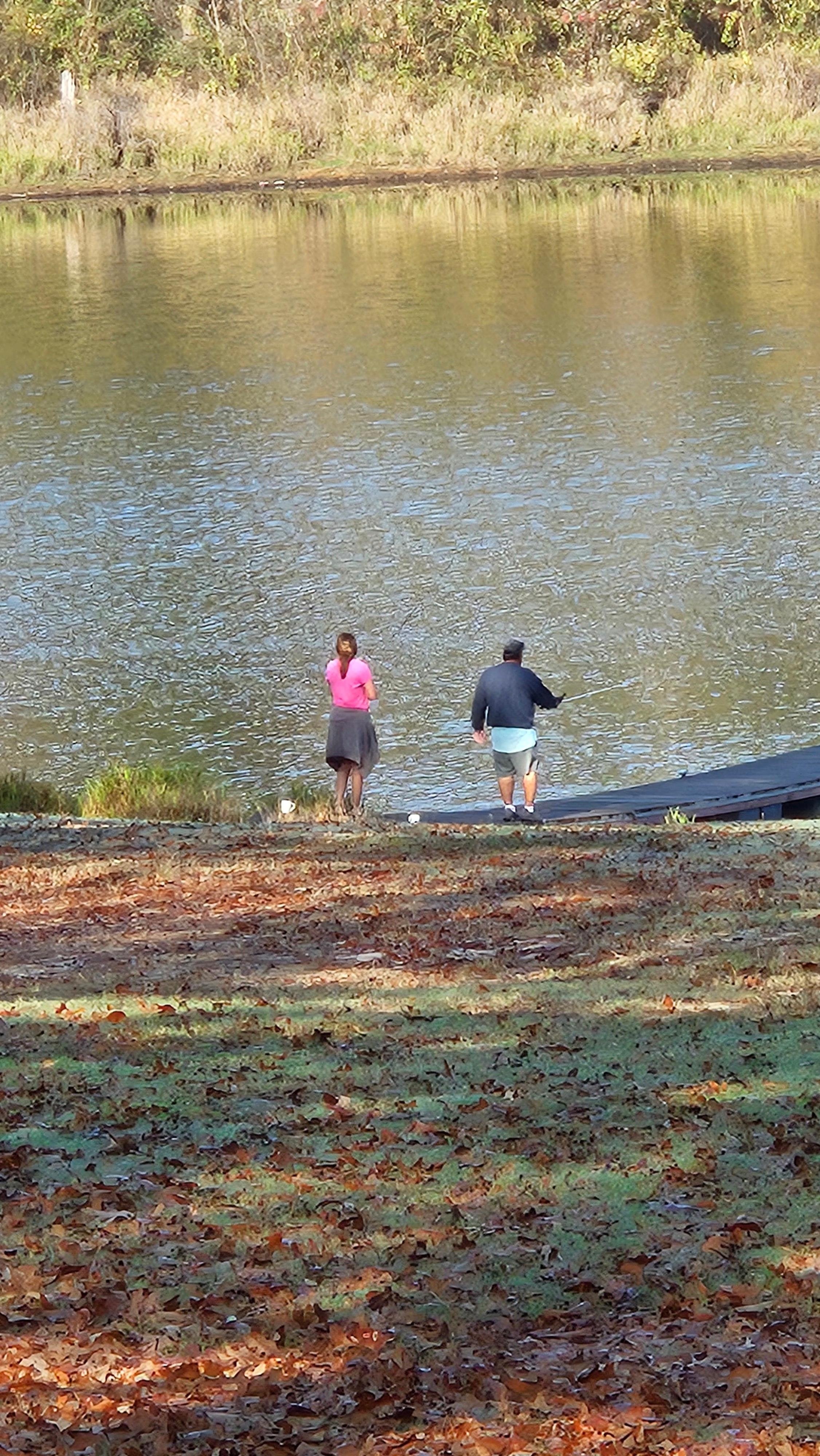 My Granddaughter and GranDad taking a stroll to the water to fish a little. 