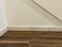 The downstairs was either dirty or had mold growing on the baseboards.