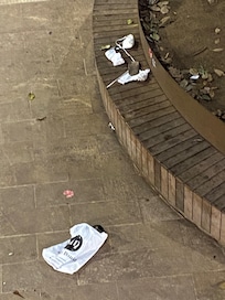 Garbage is left by locals, the city workers clean it up daily.