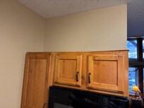 Missing trim pieces throughout kitchen