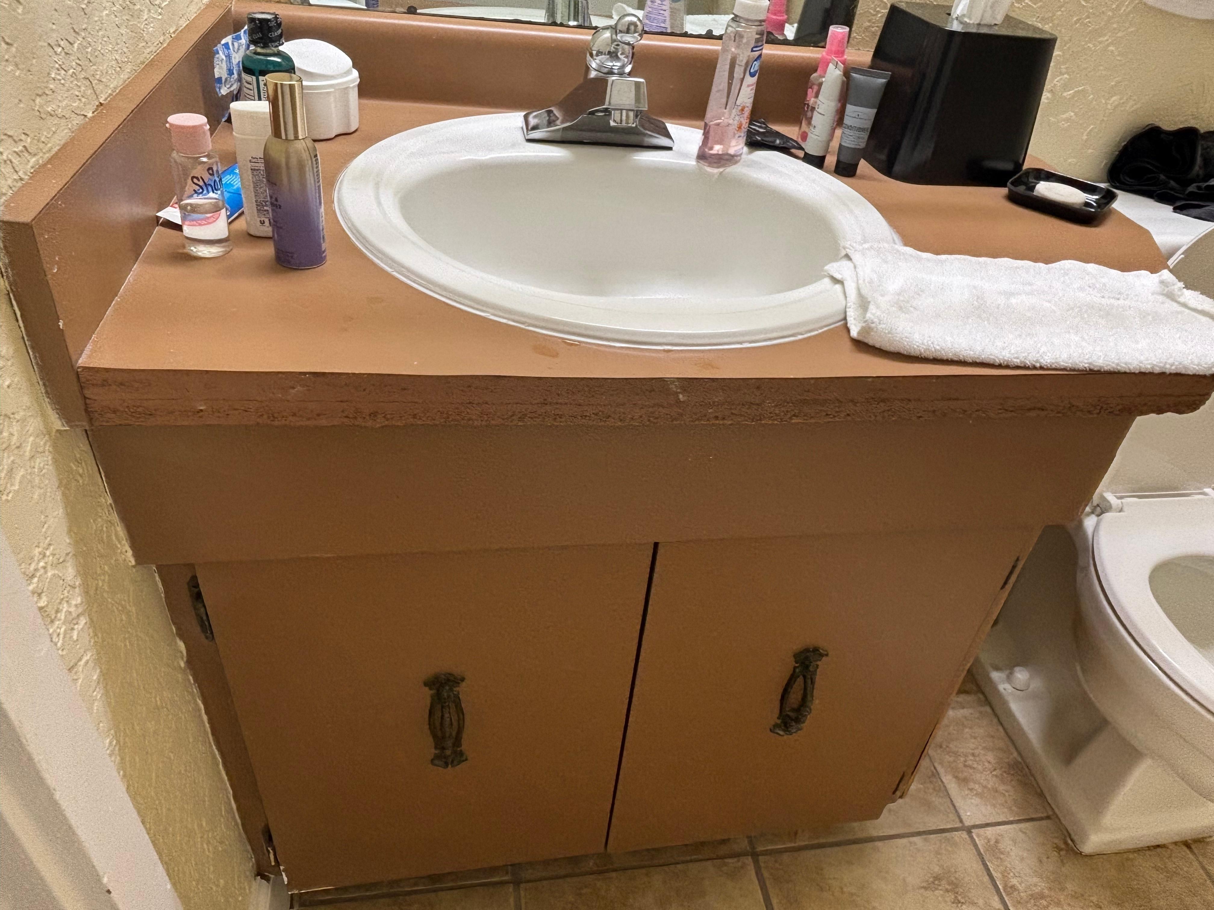 The bathroom with a toddler sized toilet.