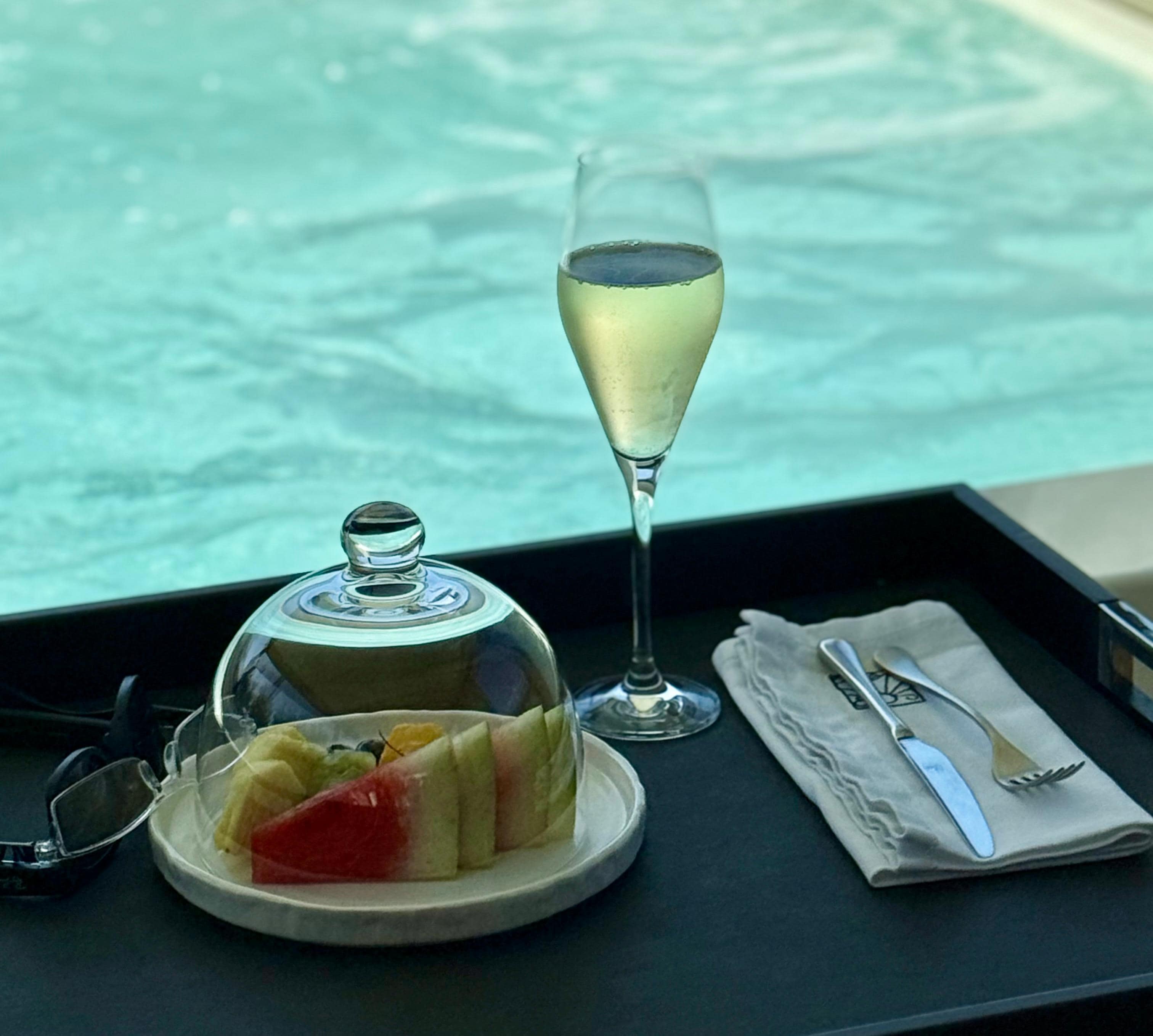 Have prosecco & fruit by the  hot tub