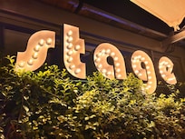 Stage rooftop bar sign