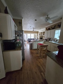 Kitchen and back livingroom with tv