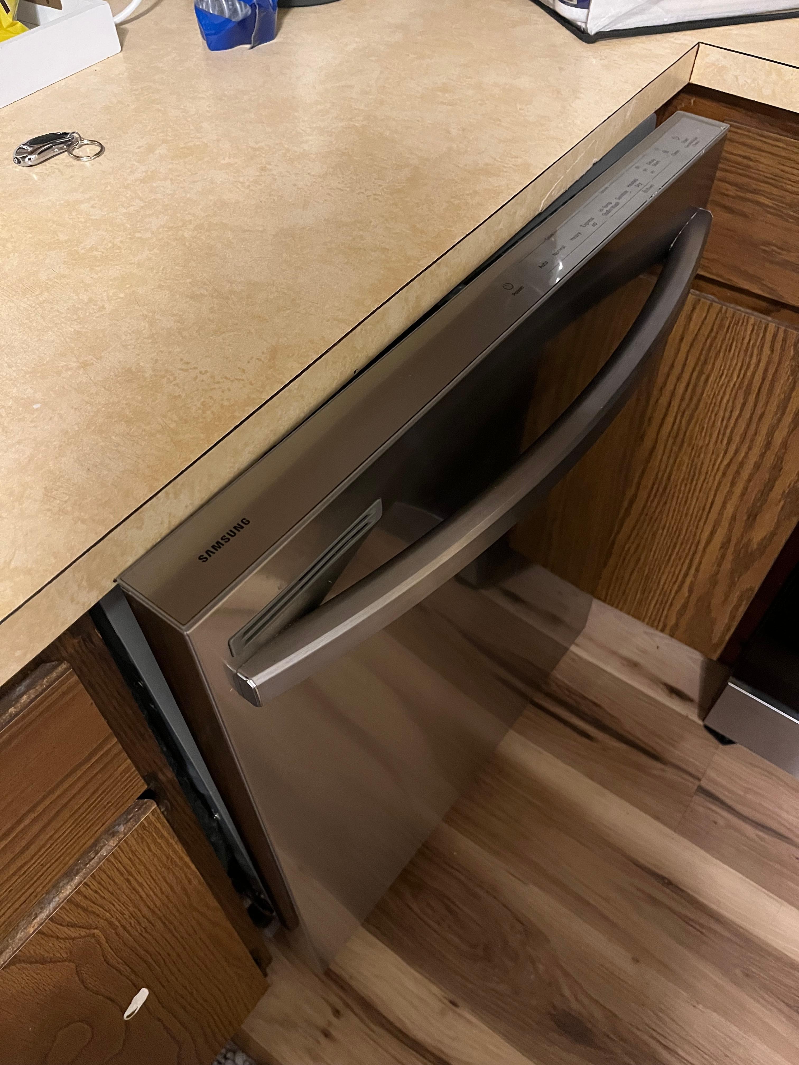 Dishwasher does not shut. Has never been used. Installed incorrectly 