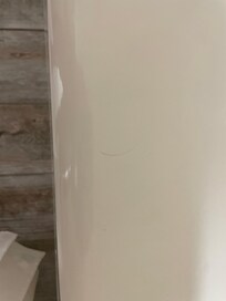 Two hairs on the bathtub as soon as I walked in, I saw them