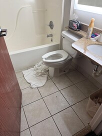 Flooded toilet with no assistance from management.