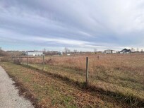 From the driveway looking back at the property you can see the other houses and both rentals.