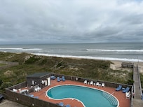 View of ocean and pool