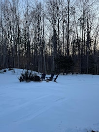 Side yard with fire pit.