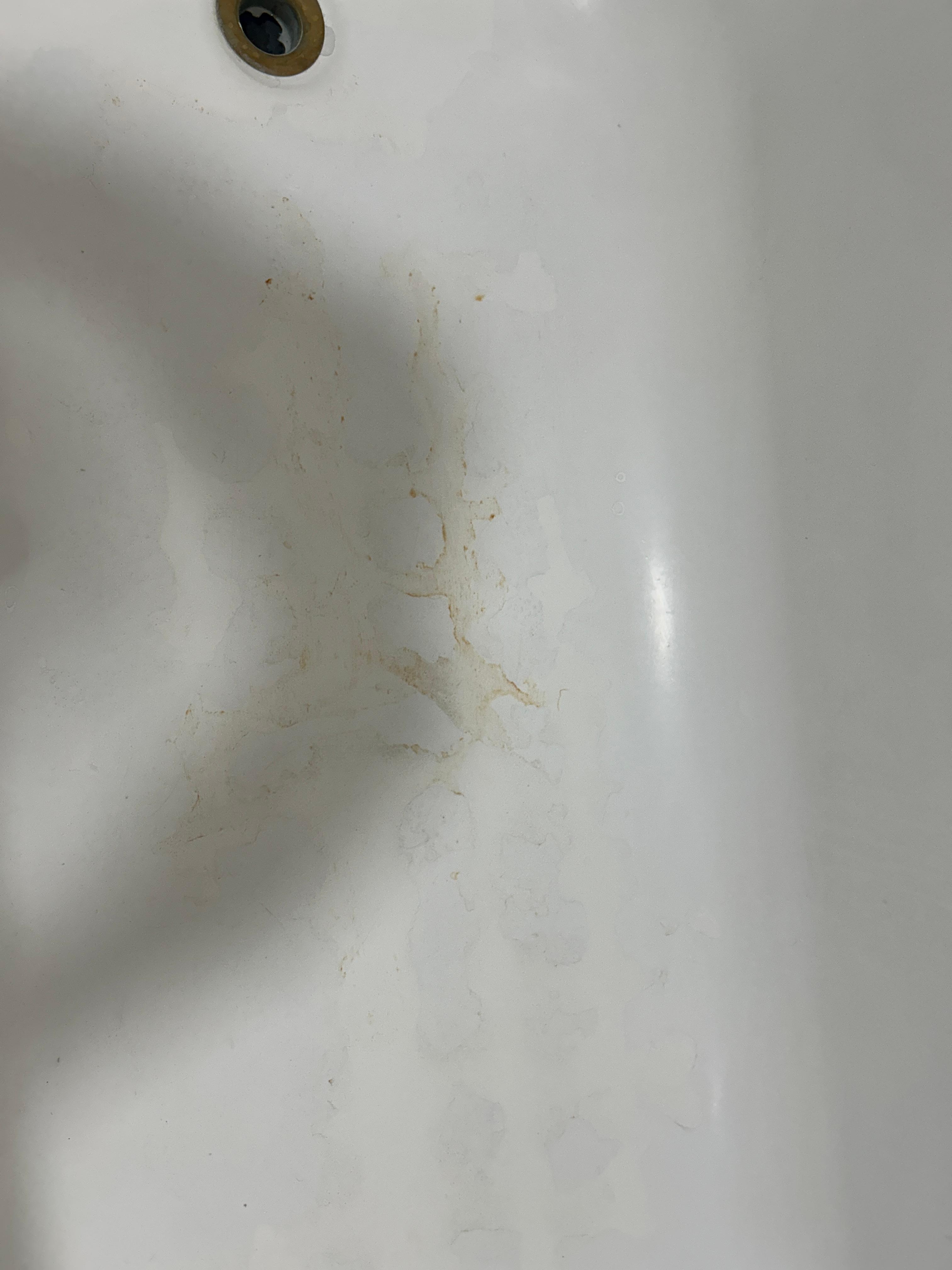 Unknown stain in the tub. 