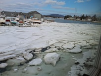 View of february ice flows and Little's Marina from cozy Mermaid Cottage.